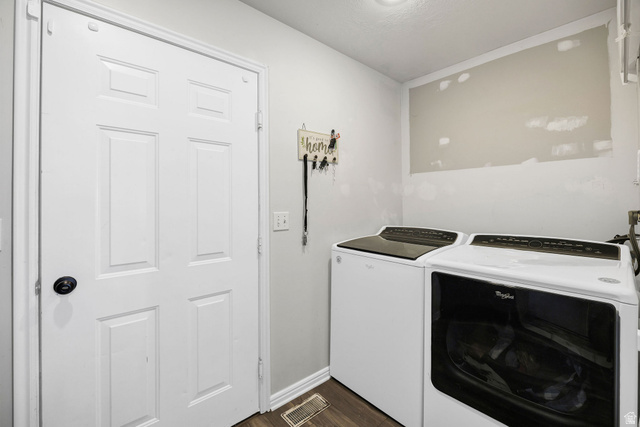 892 East 400 South Smithfield, UT 84335 - Photo 14 of 44 Laundry room featuring independent washer and dryer and dark wood finished floors