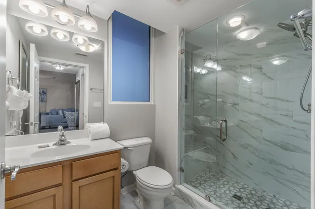 a aerial view of a house with a swimming pool patio and outdoor seating