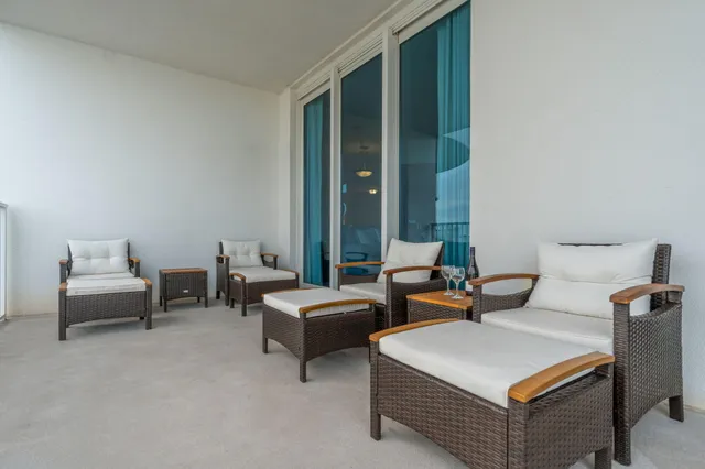 a view of a garden with a building in the background