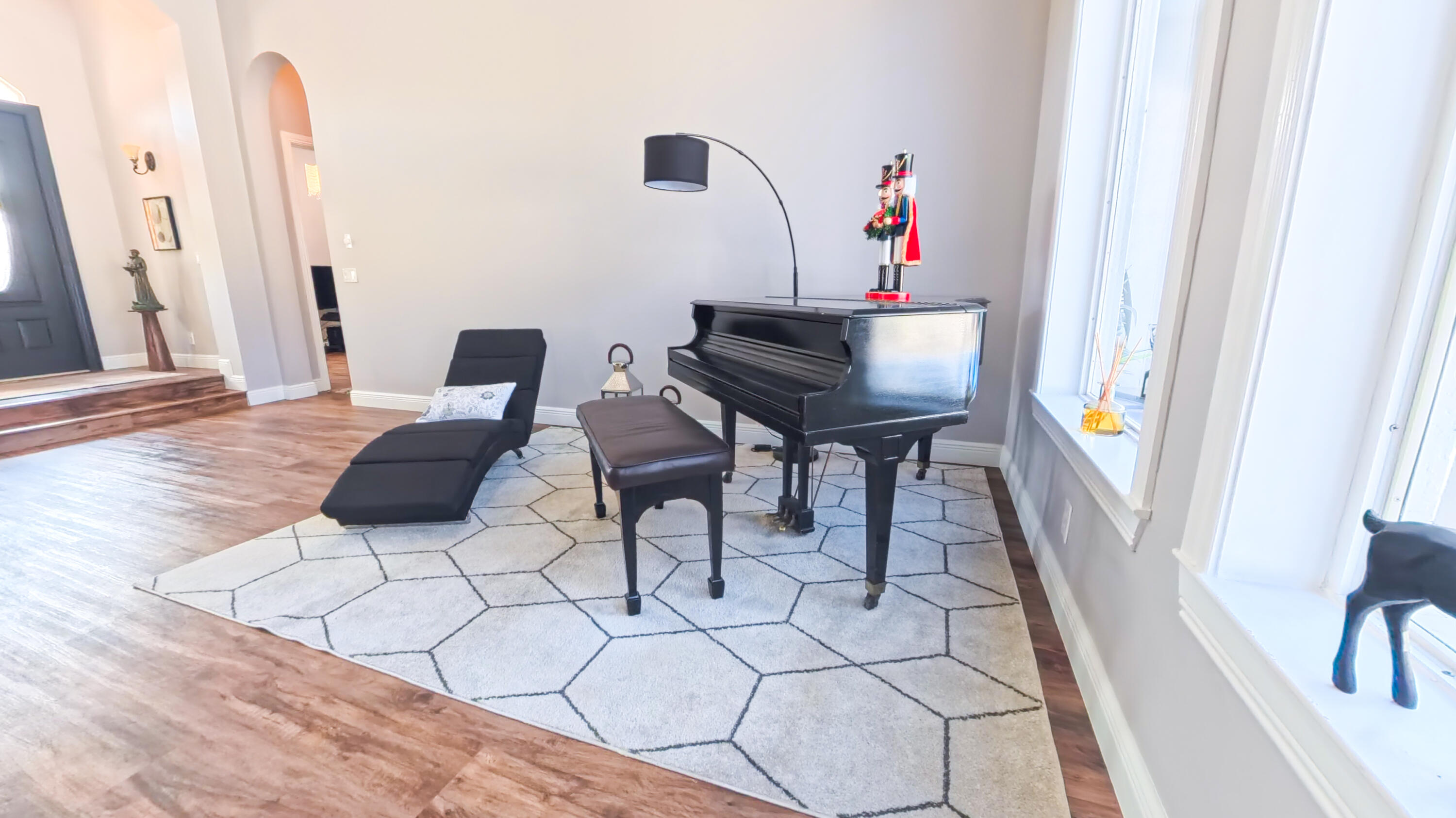 14225 43rd Road North Loxahatchee, FL 33470 - Photo 19 of 108 a living room with chairs and a table with wooden floor