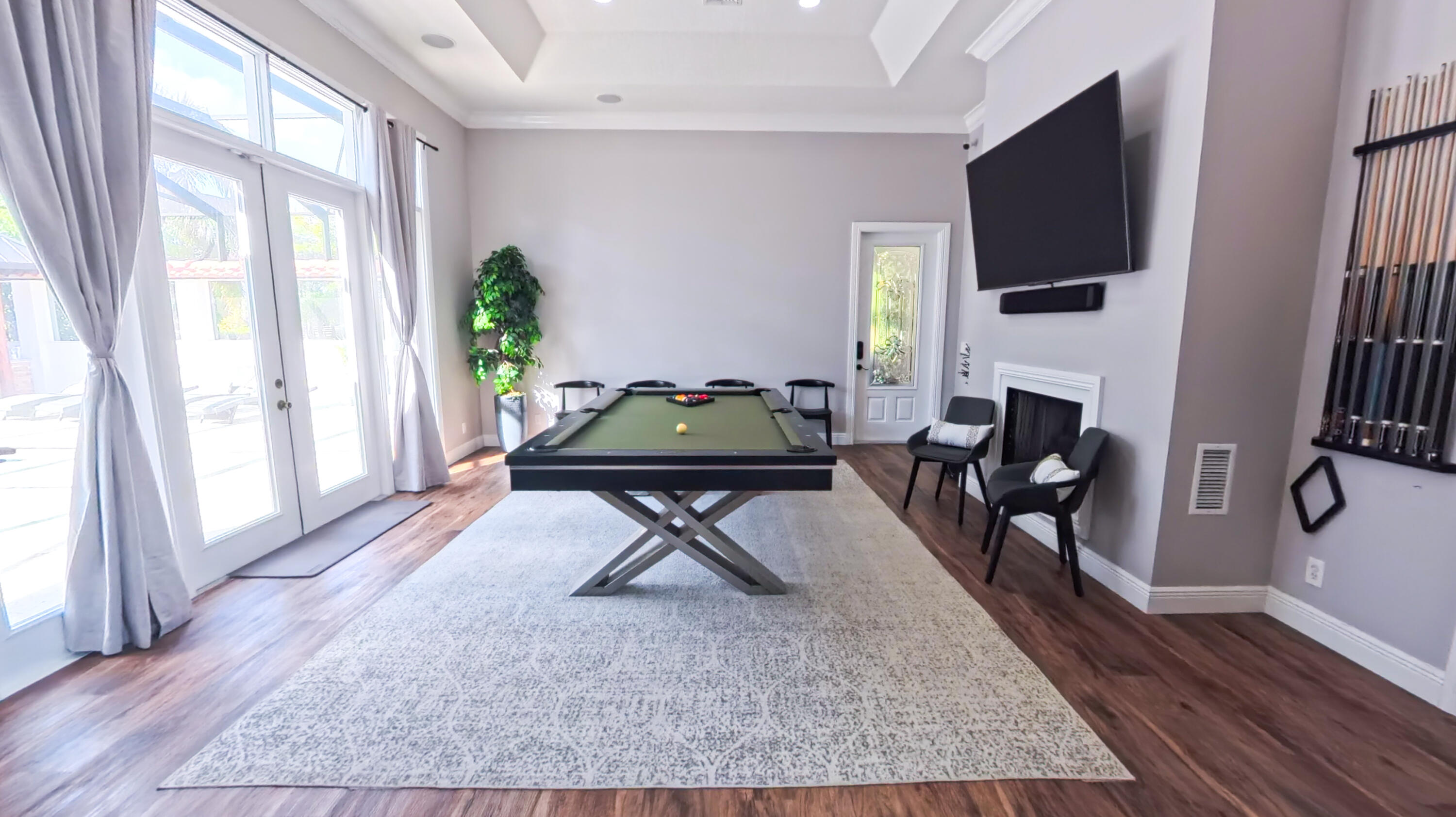 14225 43rd Road North Loxahatchee, FL 33470 - Photo 35 of 108 a living room with furniture and a flat screen tv