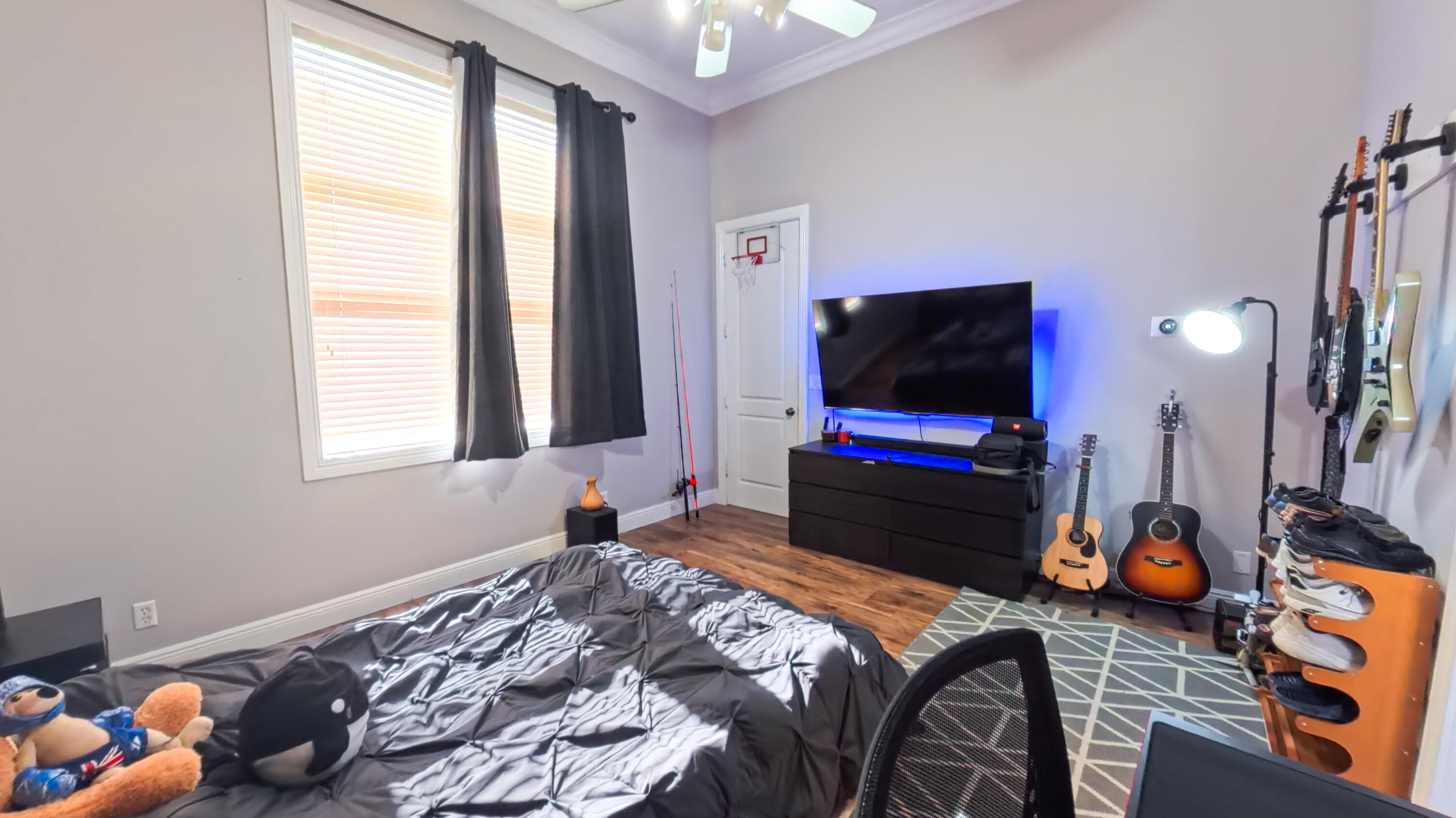 14225 43rd Road North Loxahatchee, FL 33470 - Photo 49 of 108 a bedroom with furniture and a flat screen tv