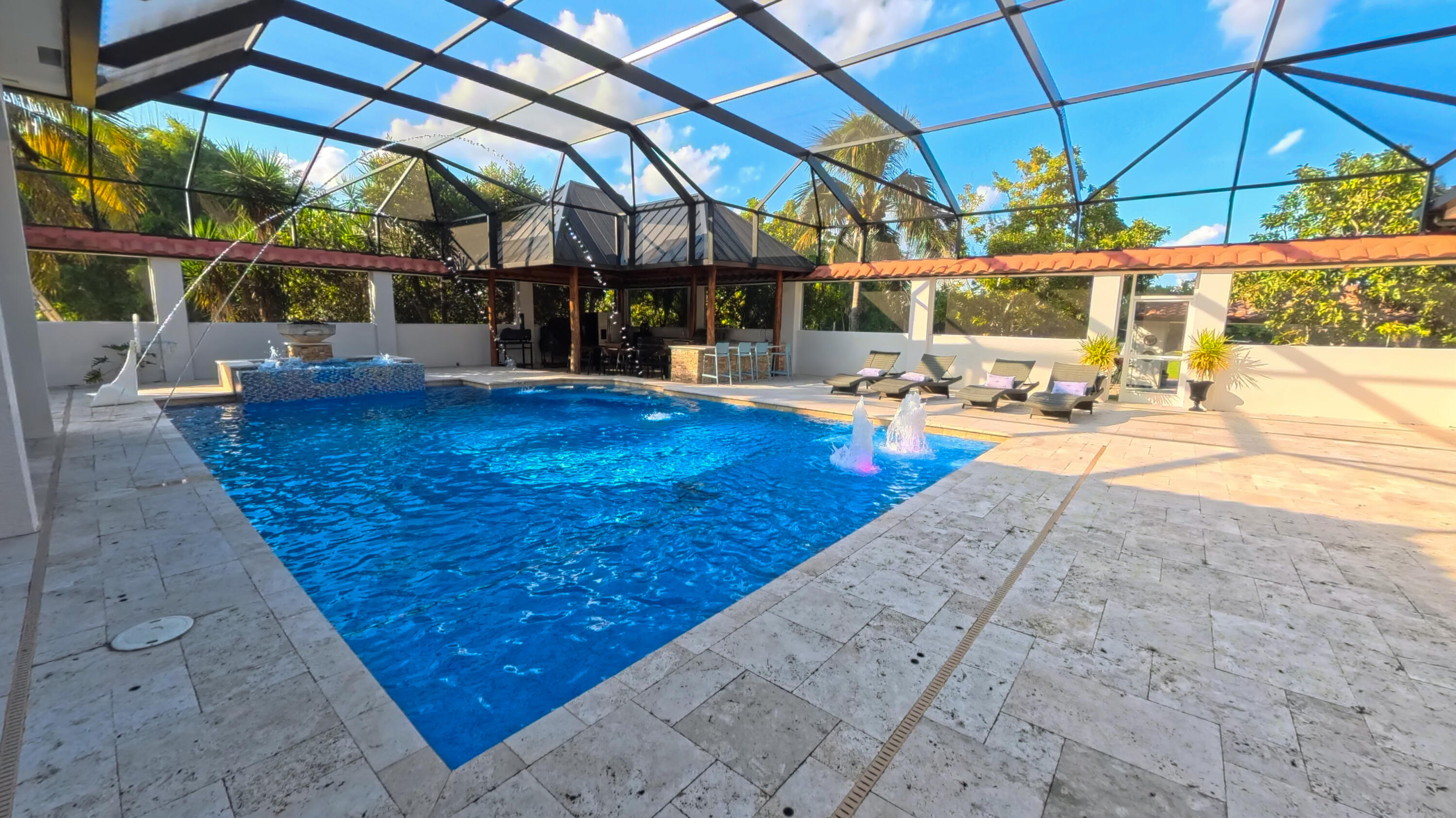 14225 43rd Road North Loxahatchee, FL 33470 - Photo 68 of 108 a view of a swimming pool with a patio