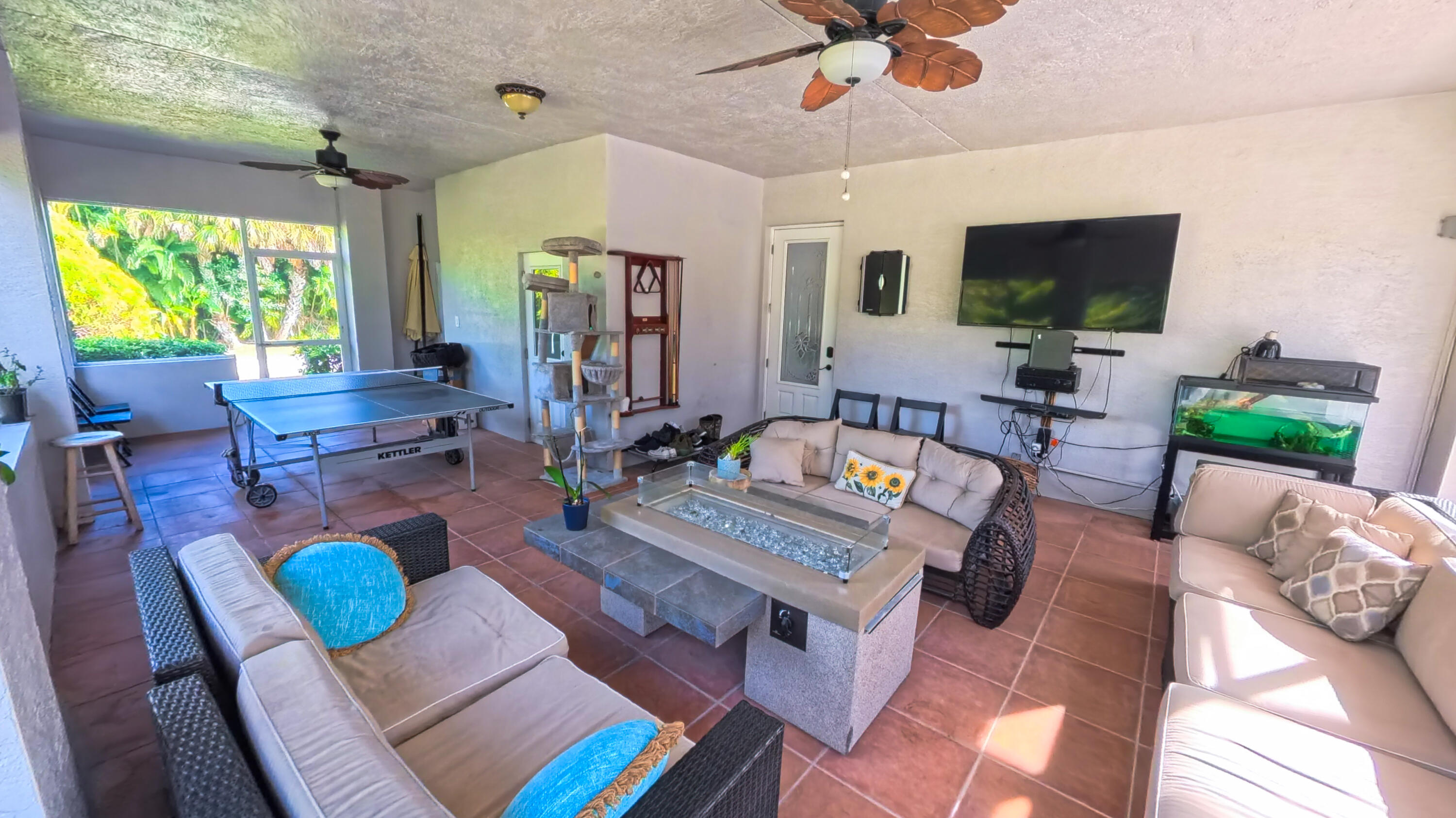 14225 43rd Road North Loxahatchee, FL 33470 - Photo 86 of 108 a living room with furniture and a flat screen tv