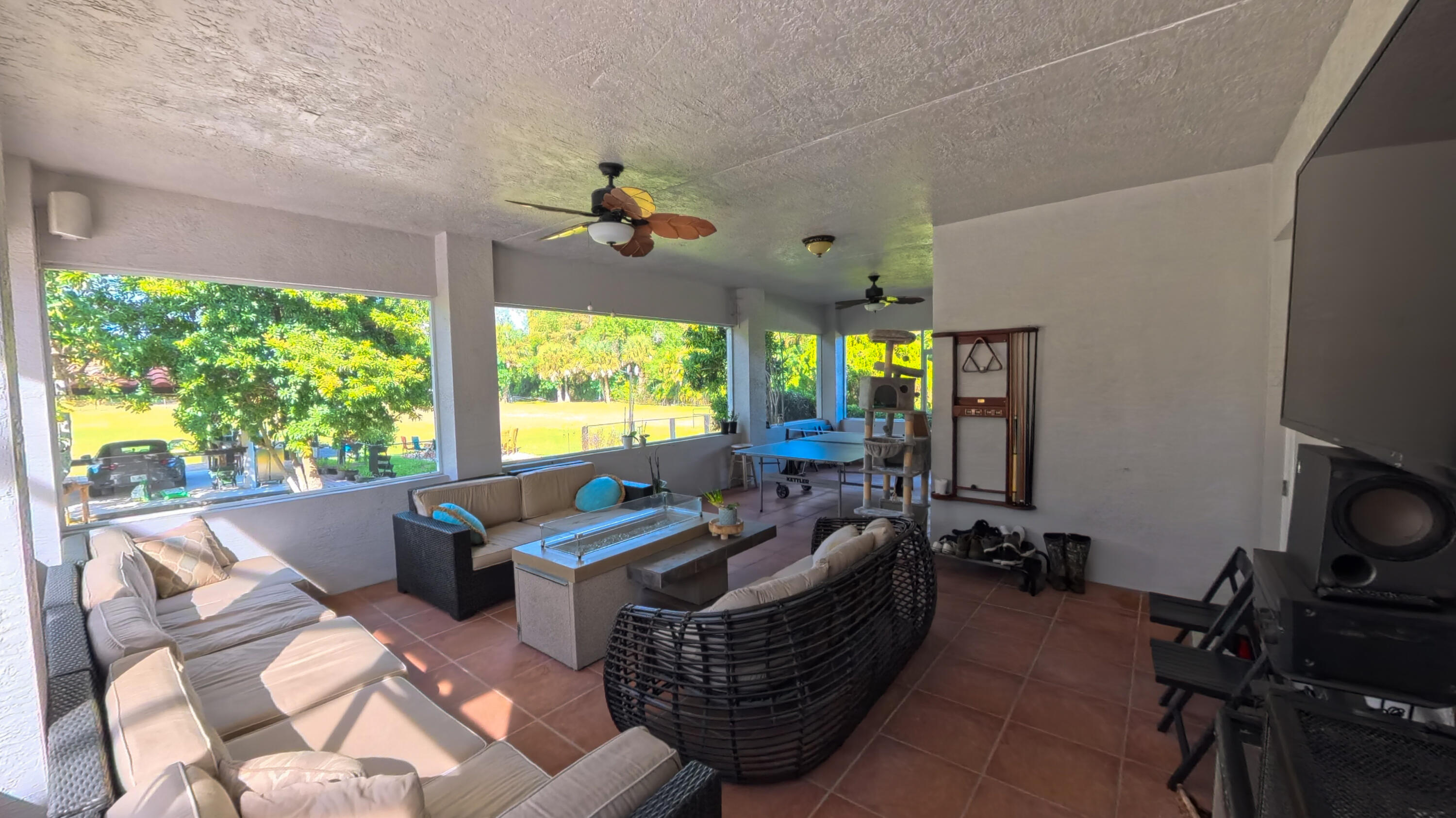 14225 43rd Road North Loxahatchee, FL 33470 - Photo 88 of 108 a living room with furniture and a flat screen tv