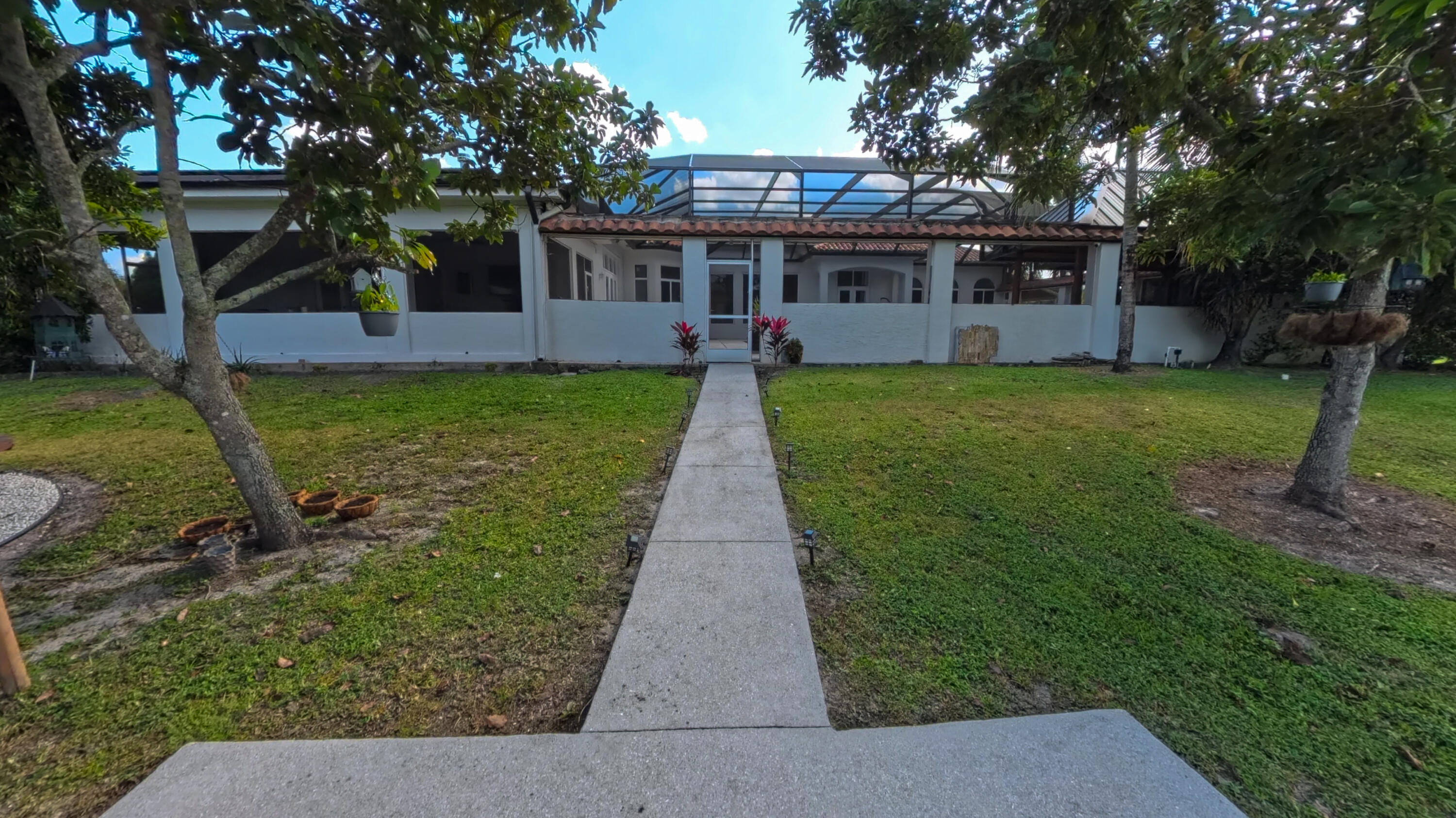 14225 43rd Road North Loxahatchee, FL 33470 - Photo 91 of 108 front view of a house with a yard