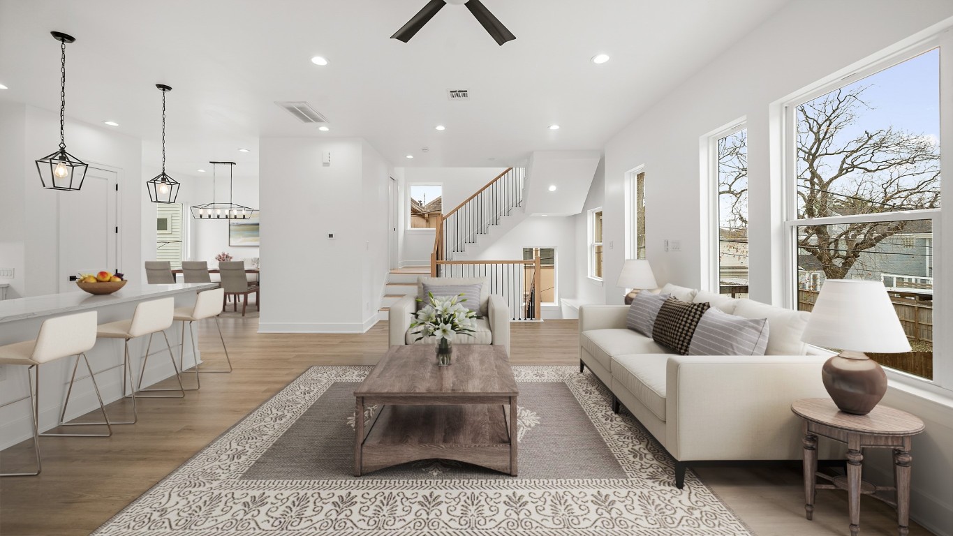 1908 Wheeler Avenue Houston, TX 77004 - Photo 16 of 43 a living room with furniture and a large window