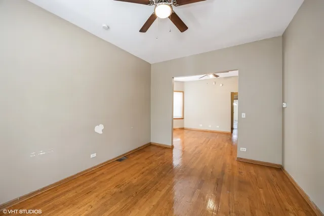 a view of a livingroom with wooden floor