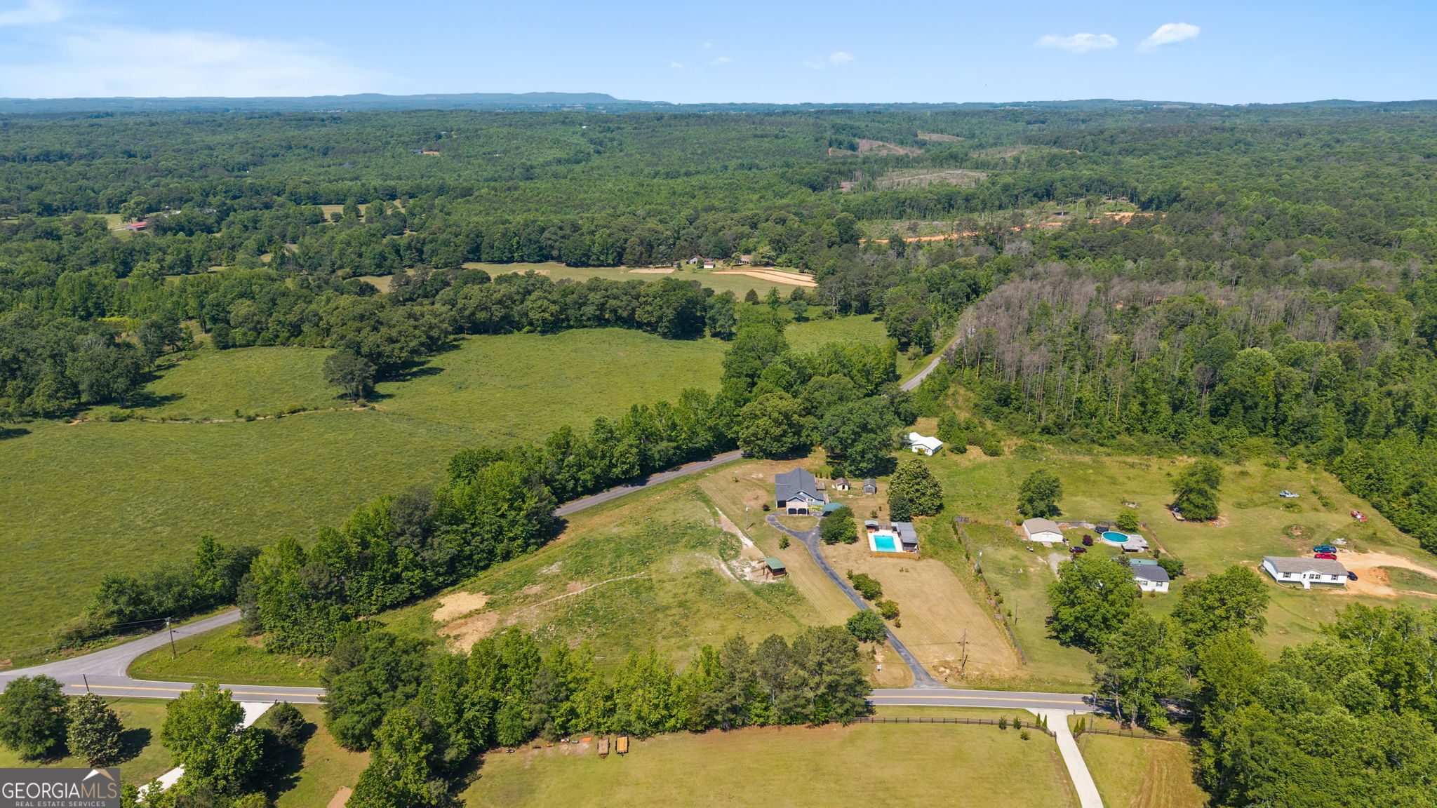 49 Frost Road Bowdon, GA 30108 - Photo 57 of 60 a view of a lake with a yard