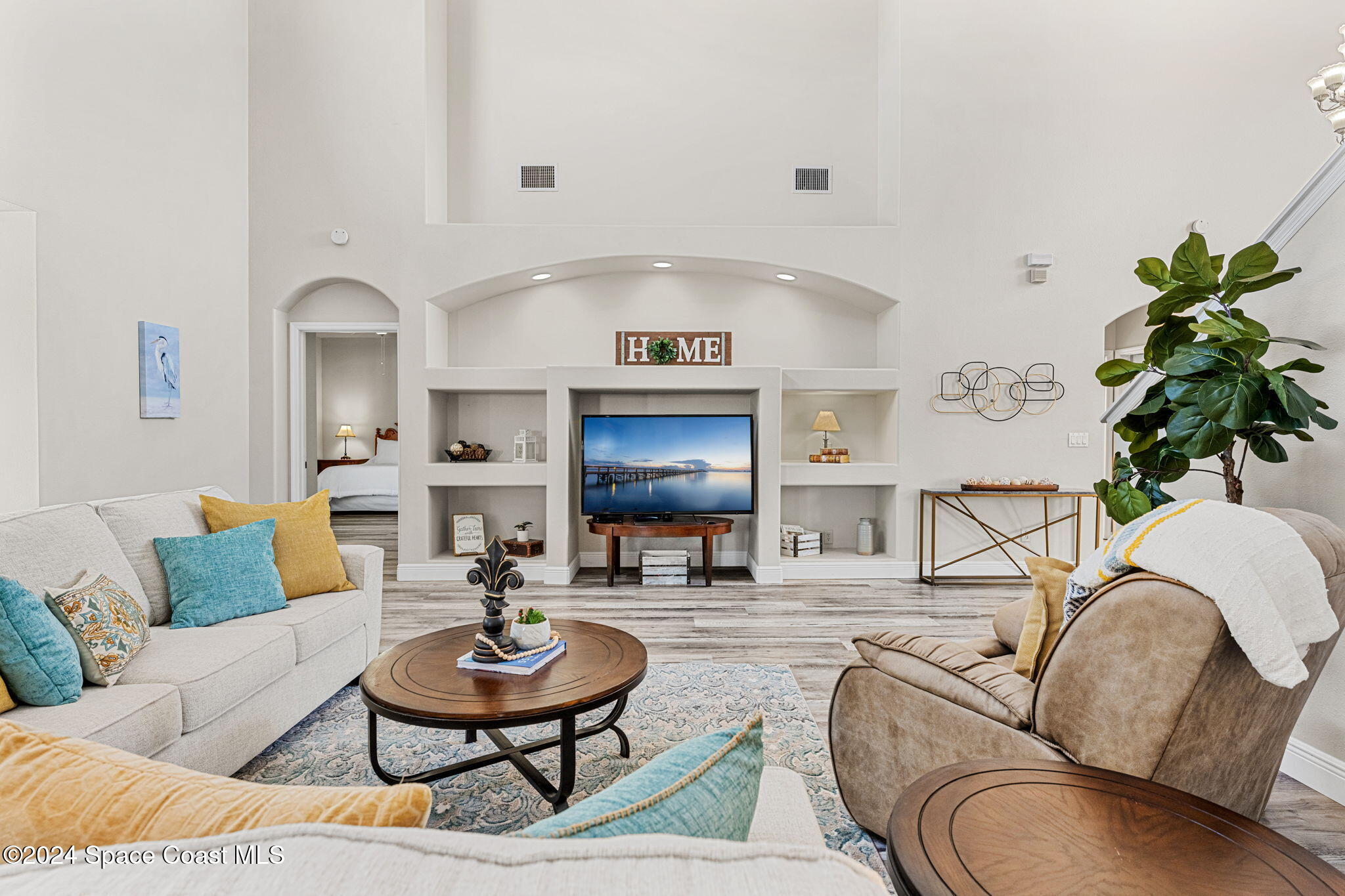 3416 Peninsula Circle Melbourne, FL 32940 - Photo 19 of 61 a living room with furniture and a rug