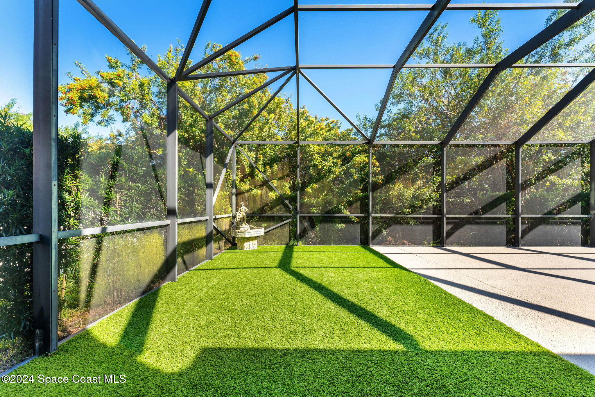 3416 Peninsula Circle Melbourne, FL 32940 - Photo 41 of 61 a view of a backyard with a swimming pool
