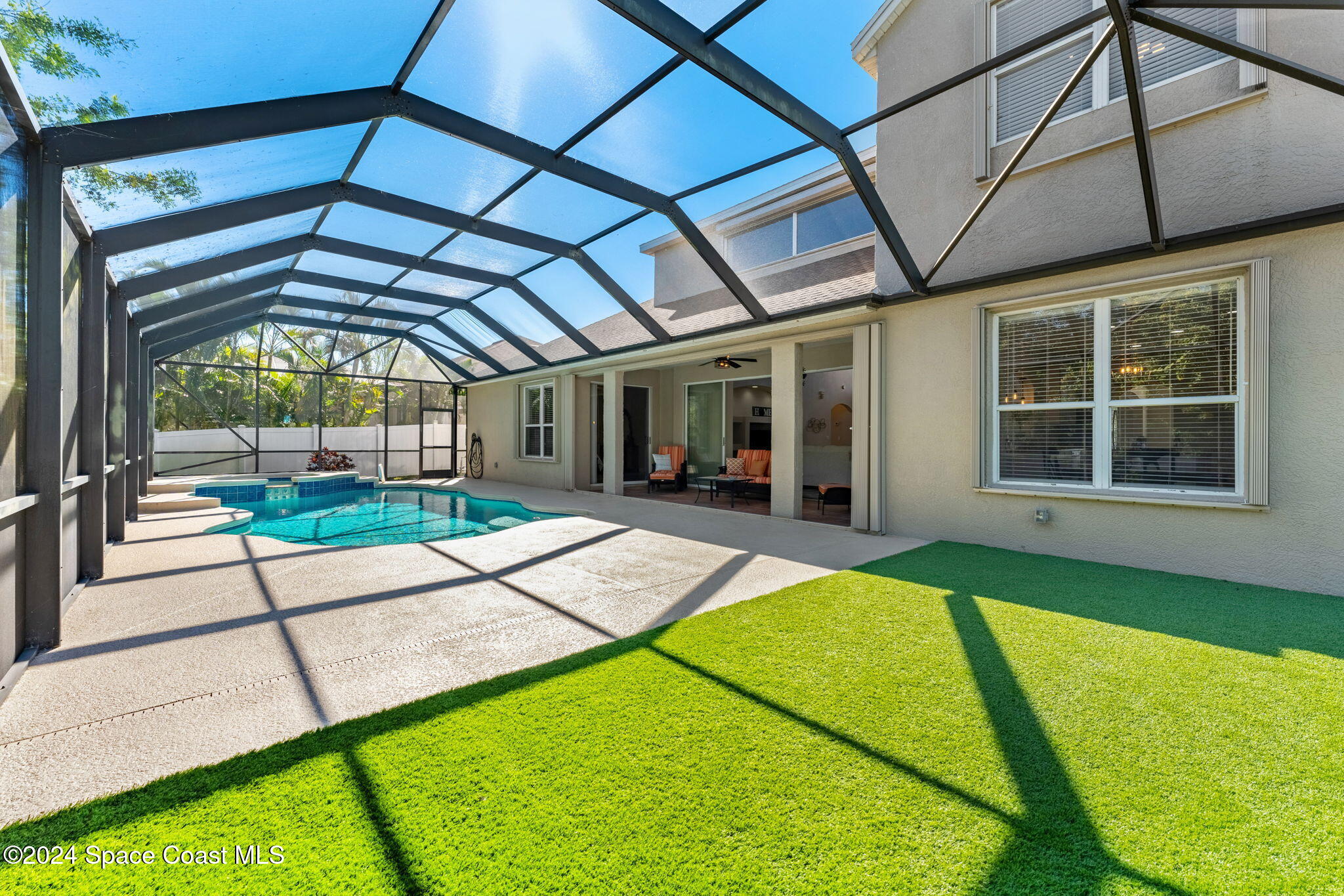 3416 Peninsula Circle Melbourne, FL 32940 - Photo 43 of 61 a view of swimming pool with an outdoor seating