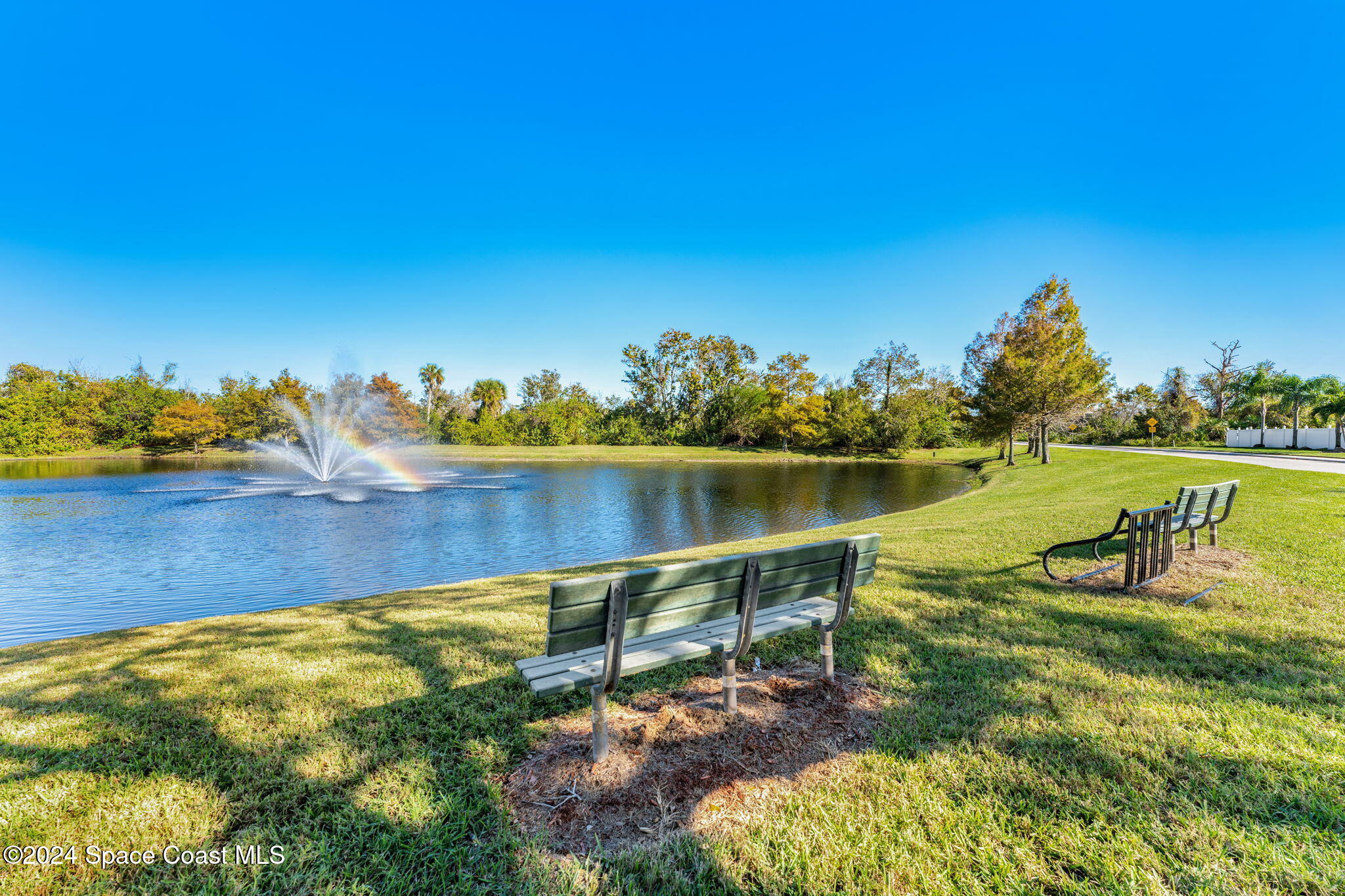 3416 Peninsula Circle Melbourne, FL 32940 - Photo 59 of 61 a view of a lake with houses