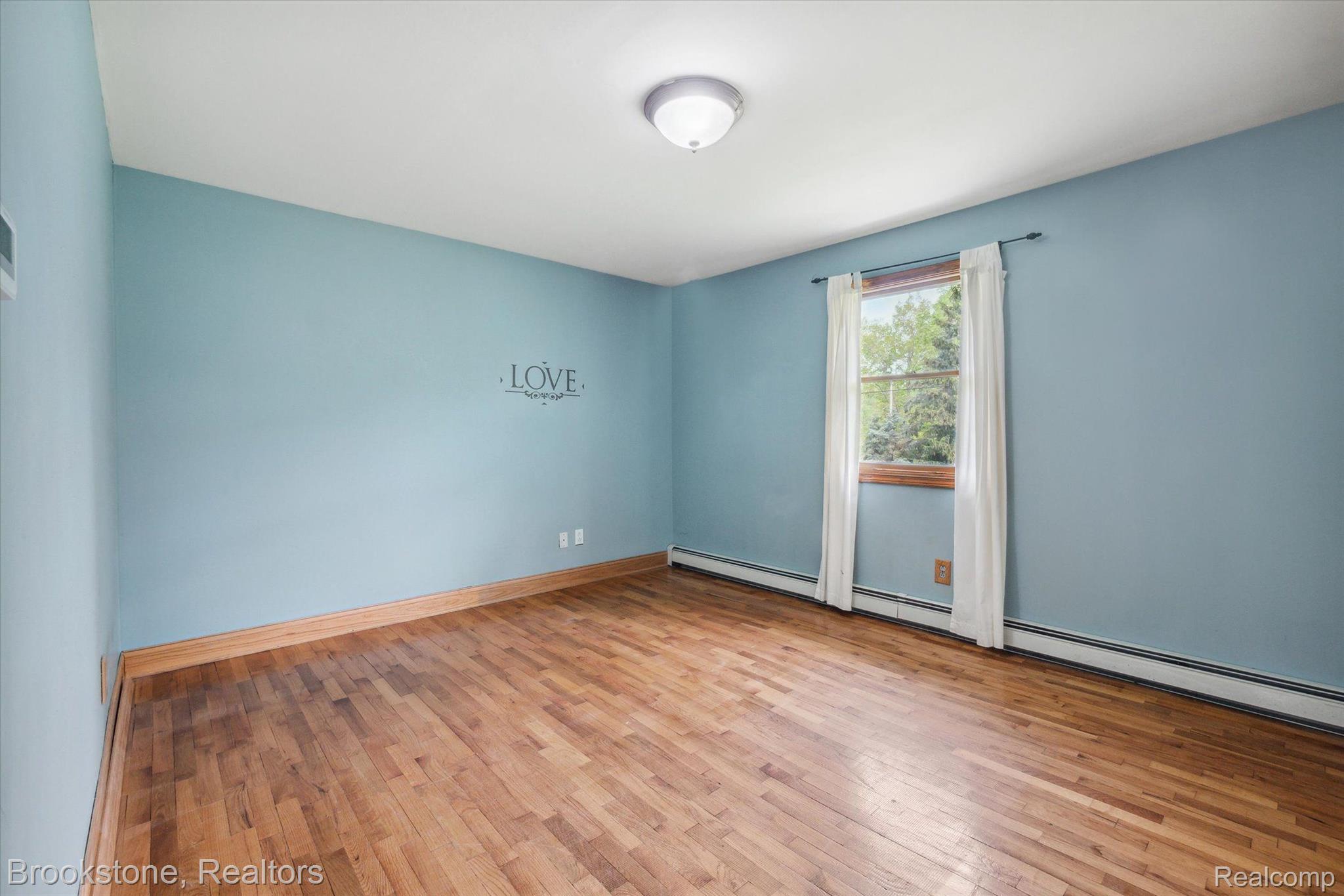 2869 Judah Road Lake Orion, MI 48359 - Photo 16 of 52 BEDROOM #1 WITH BEAUTIFUL WOOD FLOORS