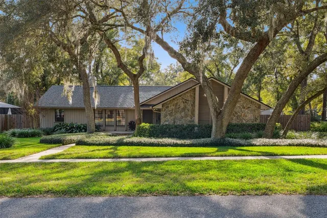 a view of a house with a swimming pool