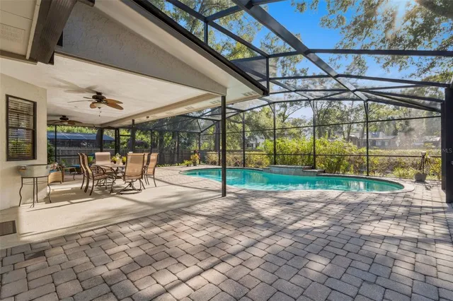 a view of a entertaining room with wooden walls