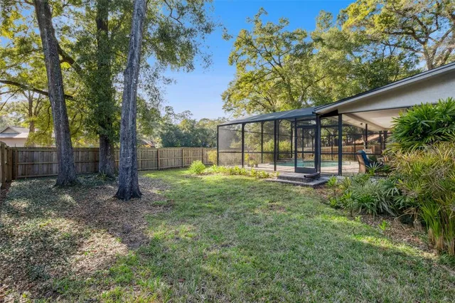 a view of backyard with green space
