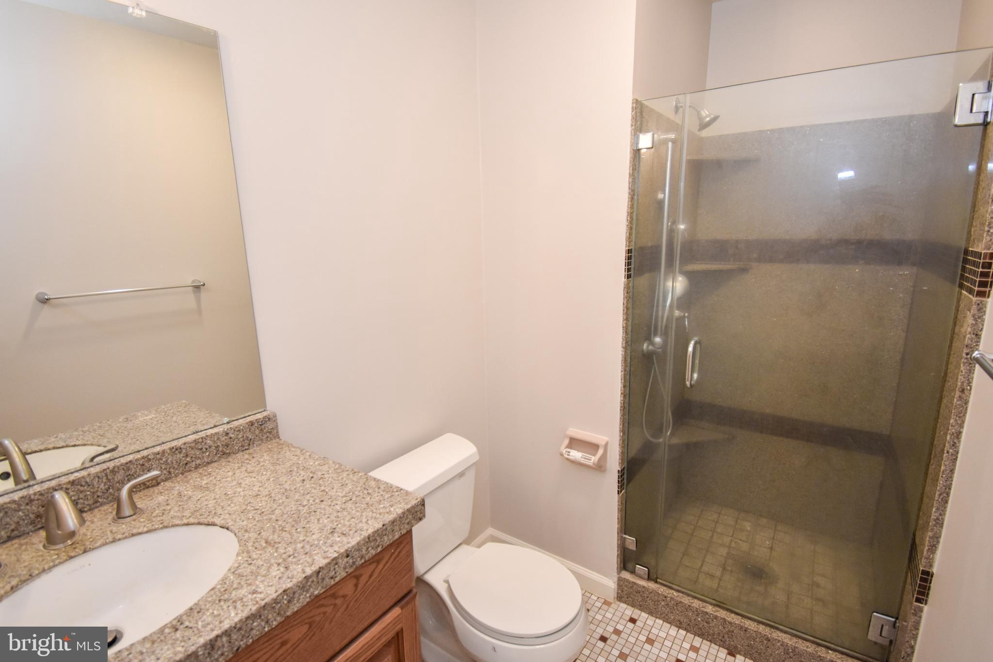 5 Sandy Ridge Drive Doylestown, PA 18901 - Photo 14 of 24 a bathroom with a granite countertop sink toilet and shower