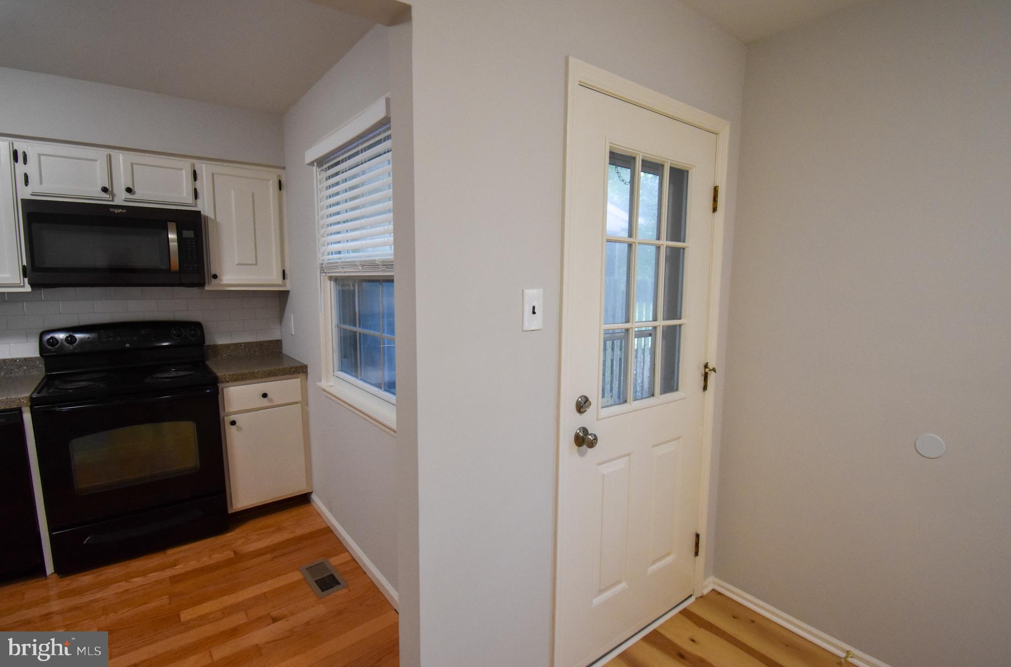 5 Sandy Ridge Drive Doylestown, PA 18901 - Photo 7 of 24 a kitchen with a refrigerator stove and microwave