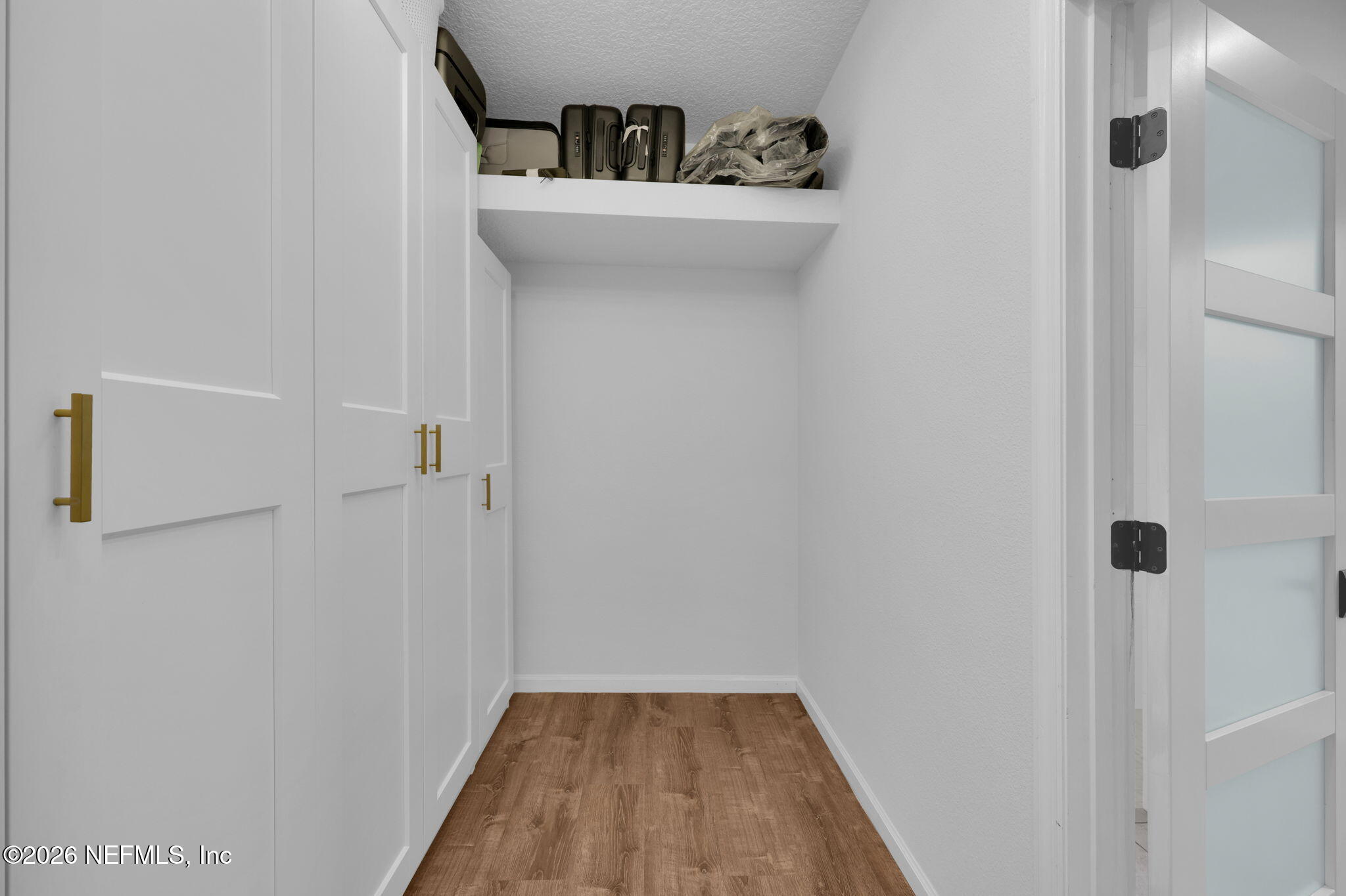 180 Taylor Ridge Avenue Ponte Vedra, FL 32081 - Photo 28 of 88 Luggage shelf in the custom cloet