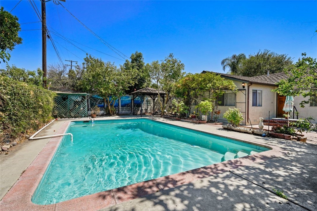 14335 Aztec Street Sylmar, CA 91342 - Photo 40 of 48 a view of a house with a yard