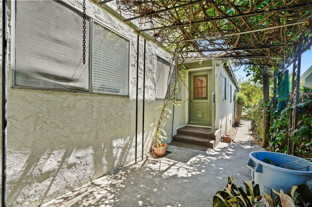 14335 Aztec Street Sylmar, CA 91342 - Photo 42 of 48 a front view of a house with a yard