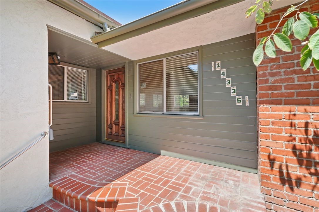 14335 Aztec Street Sylmar, CA 91342 - Photo 7 of 48 a bedroom with a bed and a window