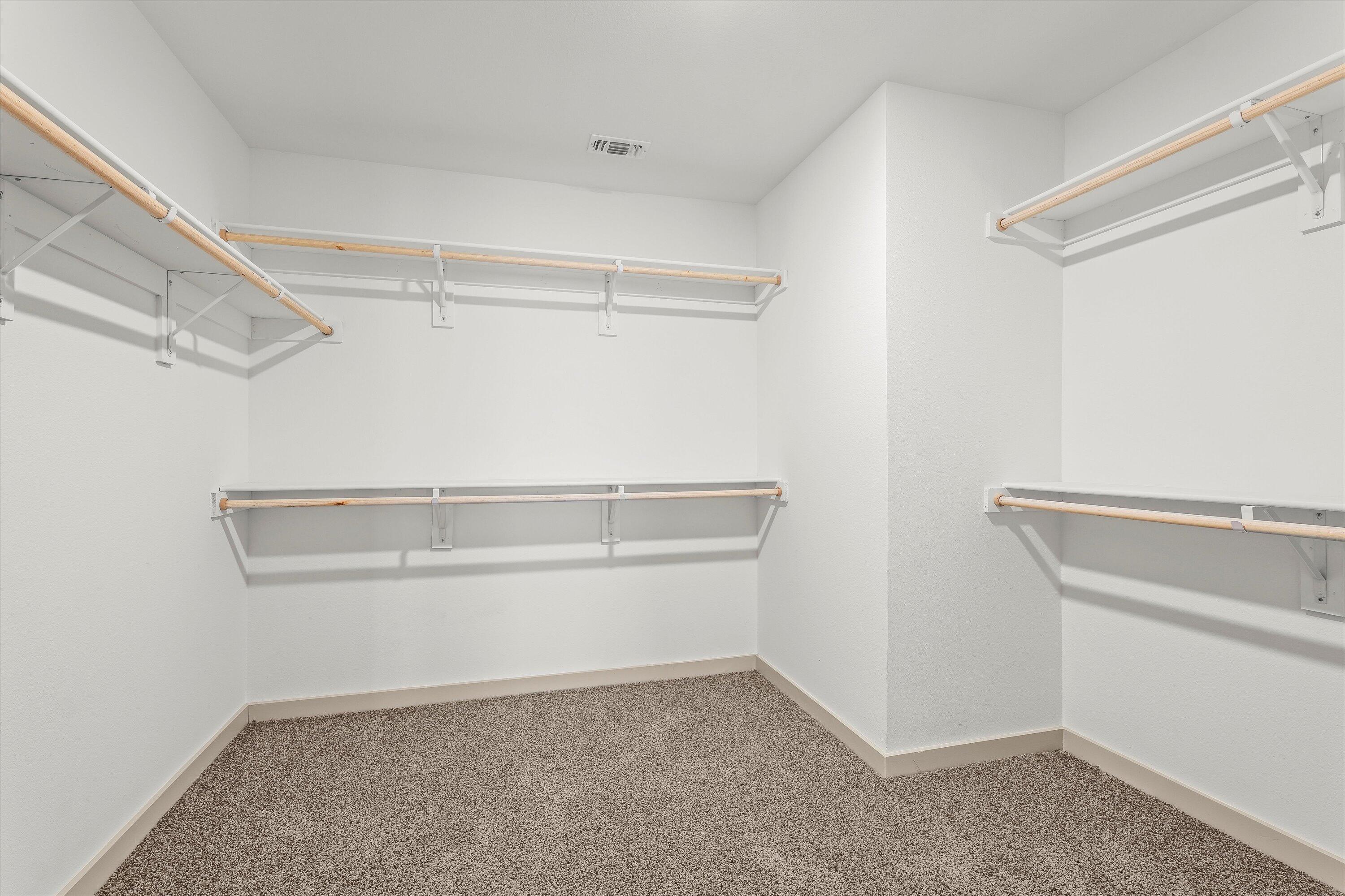 7416 9th Street Lubbock, TX 79416 - Photo 19 of 34 a view of an empty walk in closet
