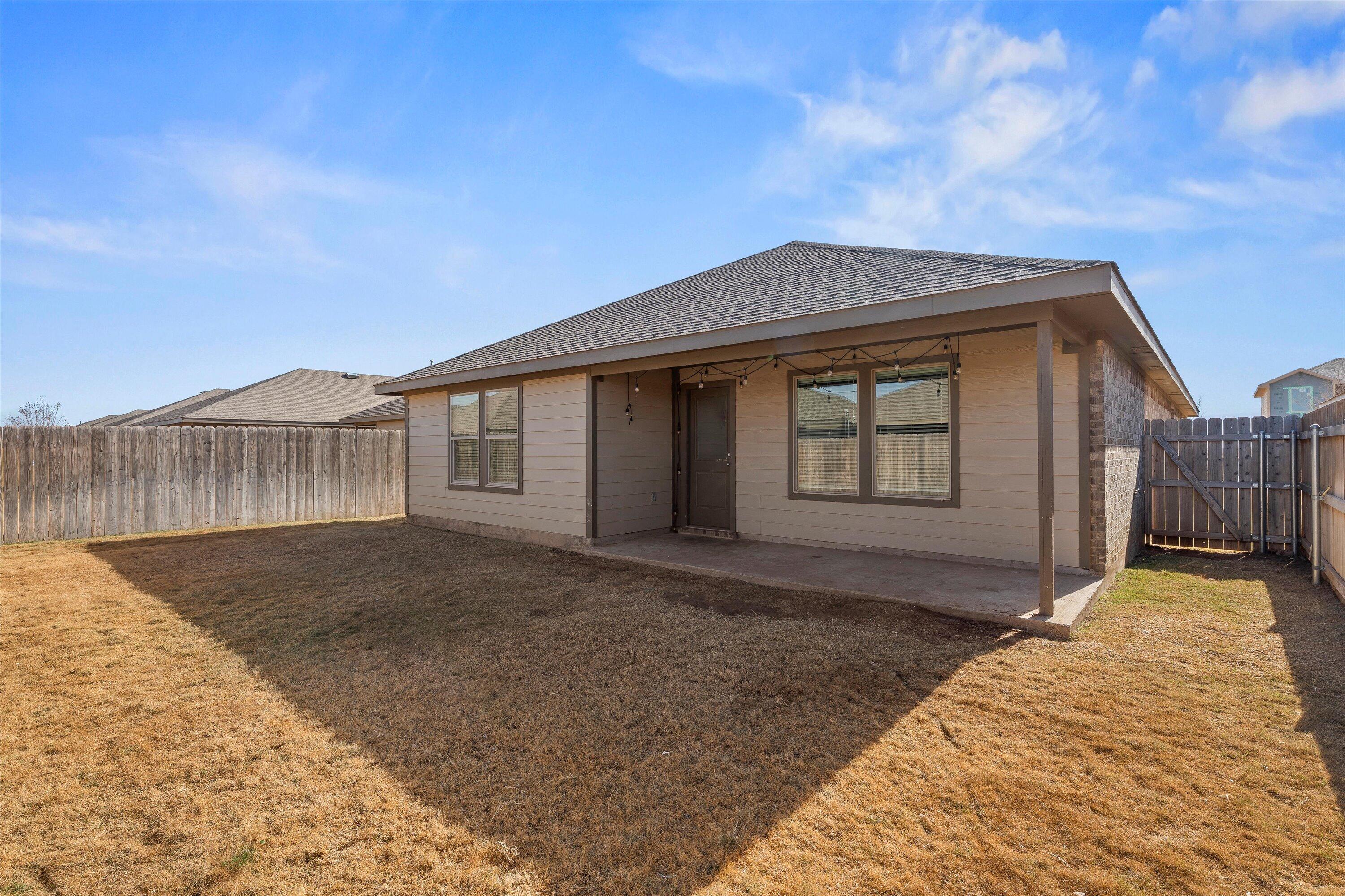 7416 9th Street Lubbock, TX 79416 - Photo 32 of 34 a front view of a house
