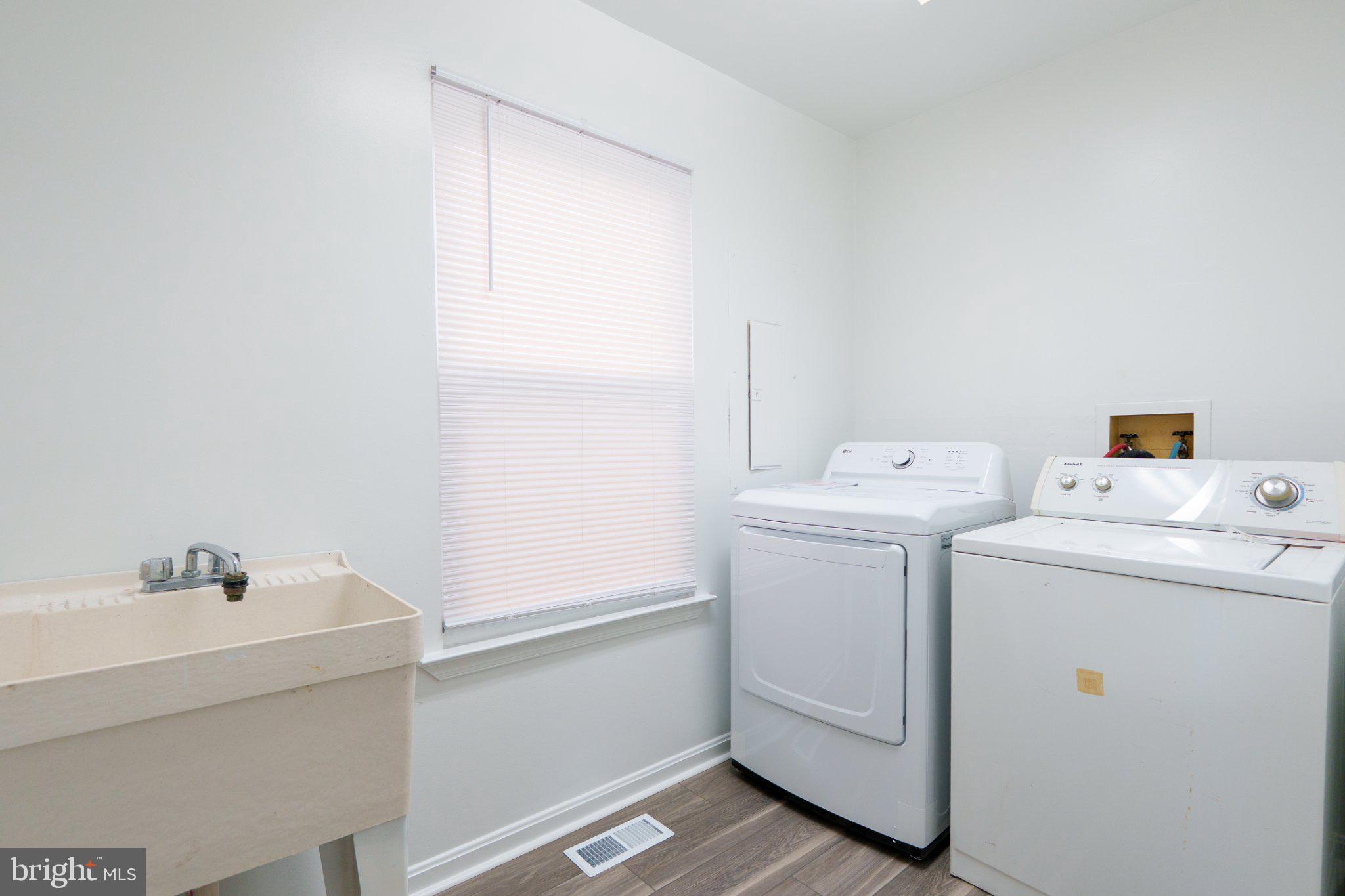 829 Shore Drive Edgewater, MD 21037 - Photo 27 of 29 Bright and functional laundry space.
