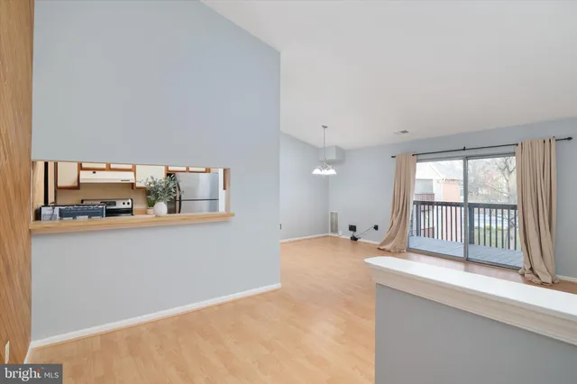 a large white bed in a white room