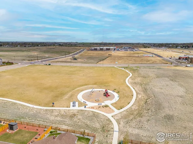 a view of a swimming pool and an outdoor space