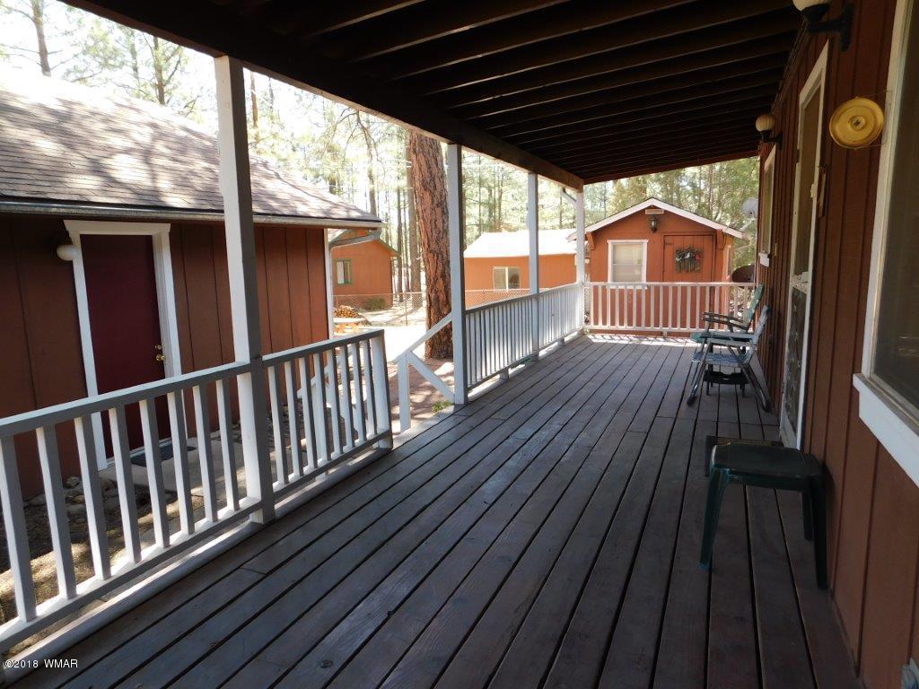 2021 Lumber Valley Road Overgaard, AZ 85933 - Photo 4 of 39 a view of balcony with wooden floor
