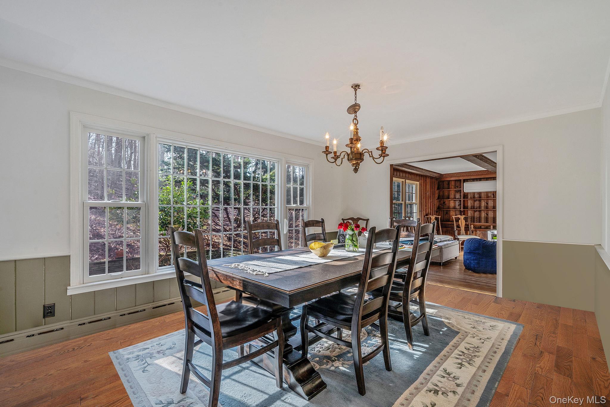 1 Spring Hollow Road Nissequogue, NY 11780 - Photo 12 of 17 a view of a dining room with furniture and window