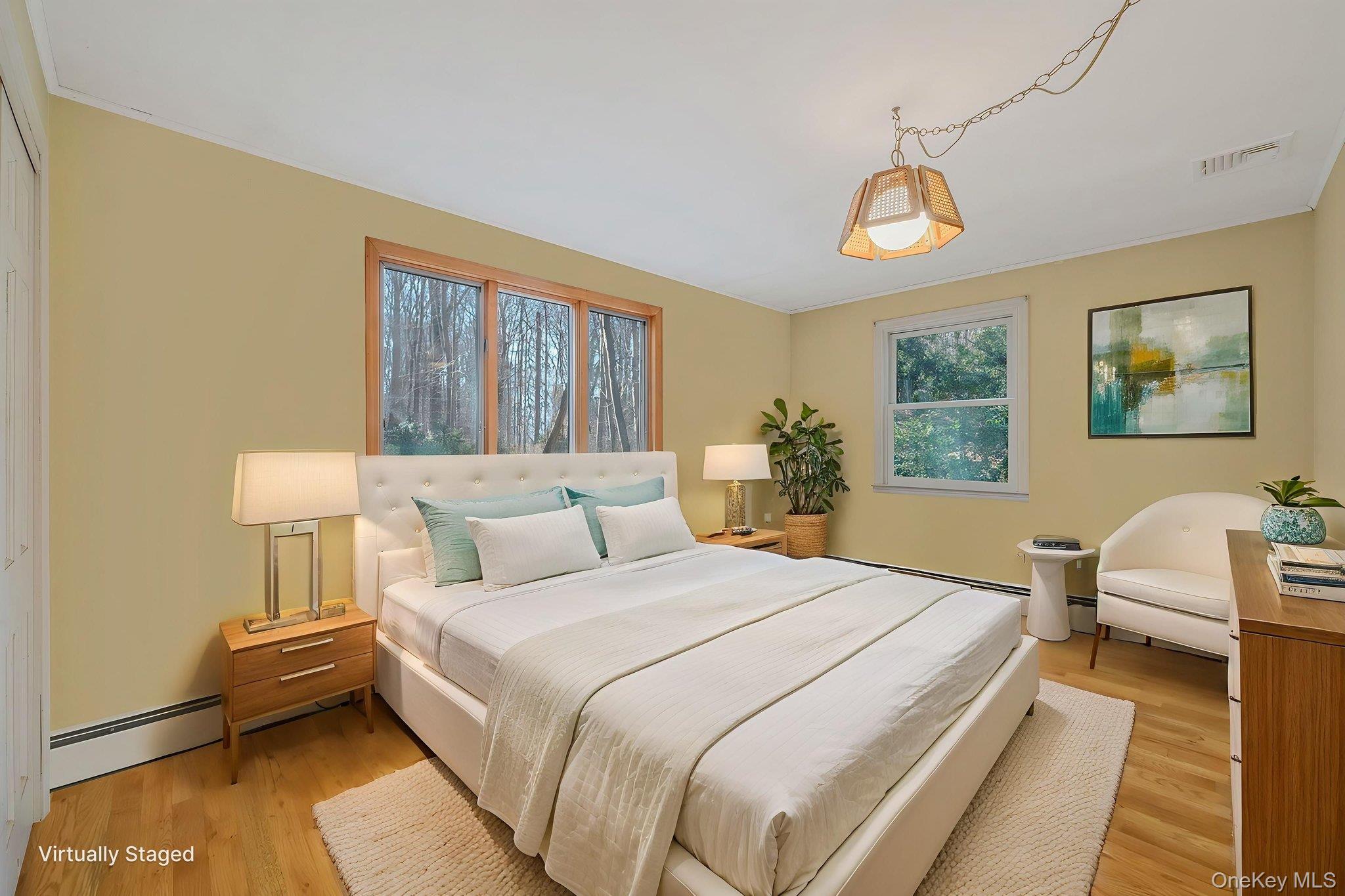 1 Spring Hollow Road Nissequogue, NY 11780 - Photo 14 of 17 a bedroom with a bed and a window