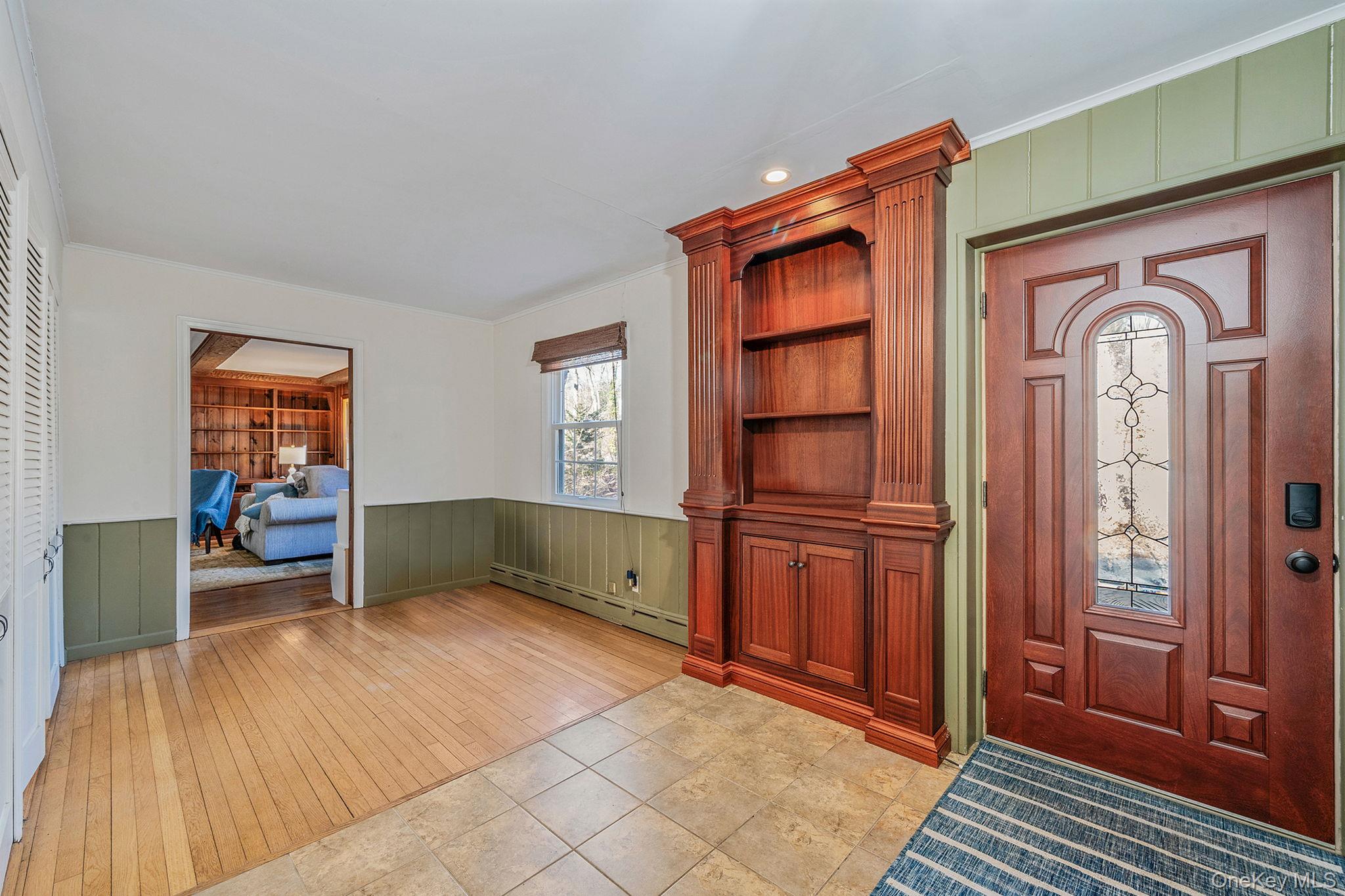 1 Spring Hollow Road Nissequogue, NY 11780 - Photo 3 of 17 an empty room with closet and windows