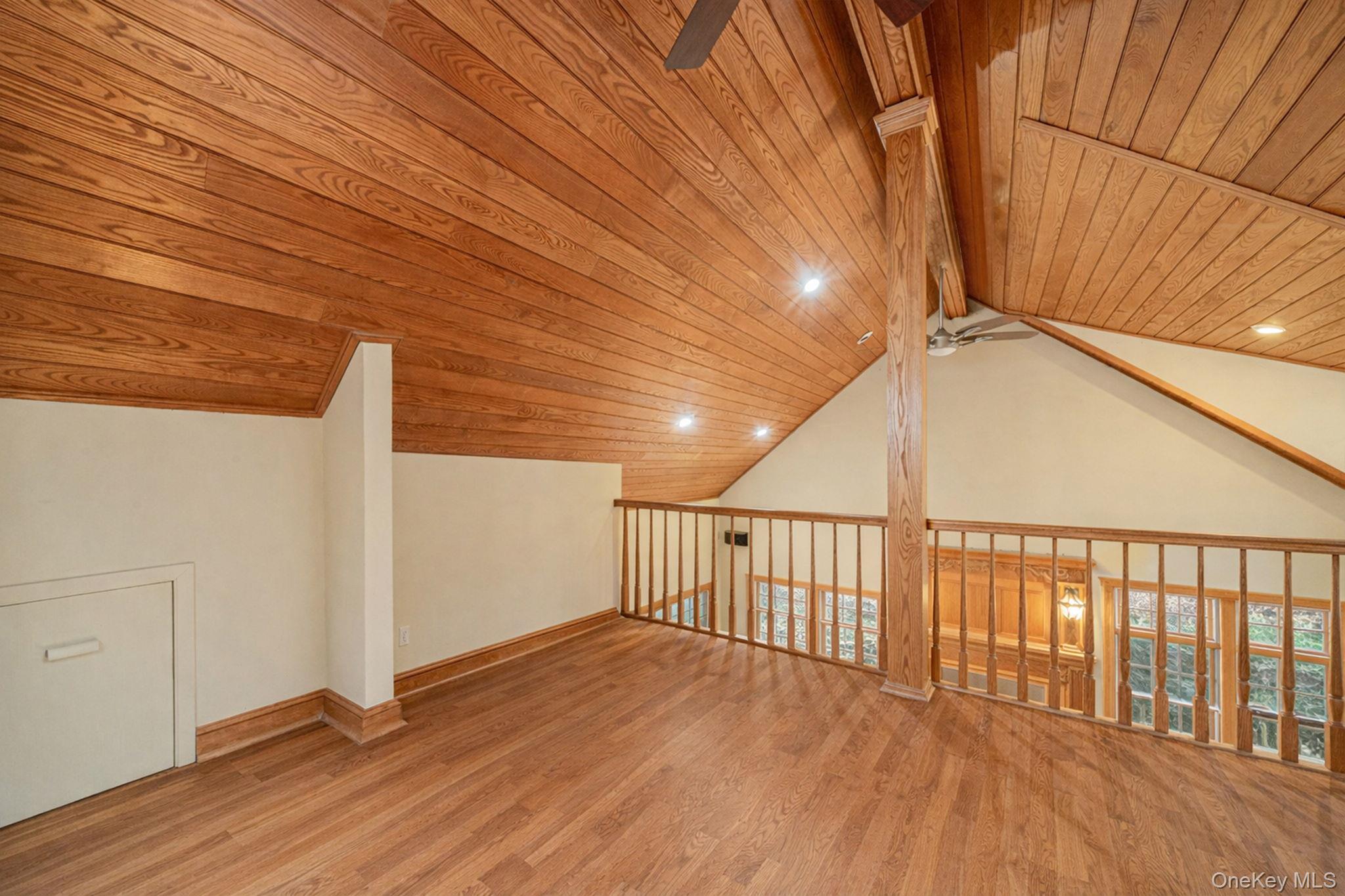 1 Spring Hollow Road Nissequogue, NY 11780 - Photo 10 of 17 a view of a balcony with wooden floor
