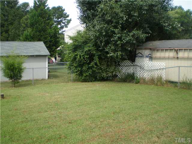 8017 Perry Creek Road Raleigh, NC 27616 - Photo 10 of 12 a view of a backyard