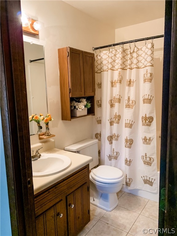 10325 Genlou Road Chesterfield, VA 23832 - Photo 10 of 20 a bathroom with a sink toilet and shower