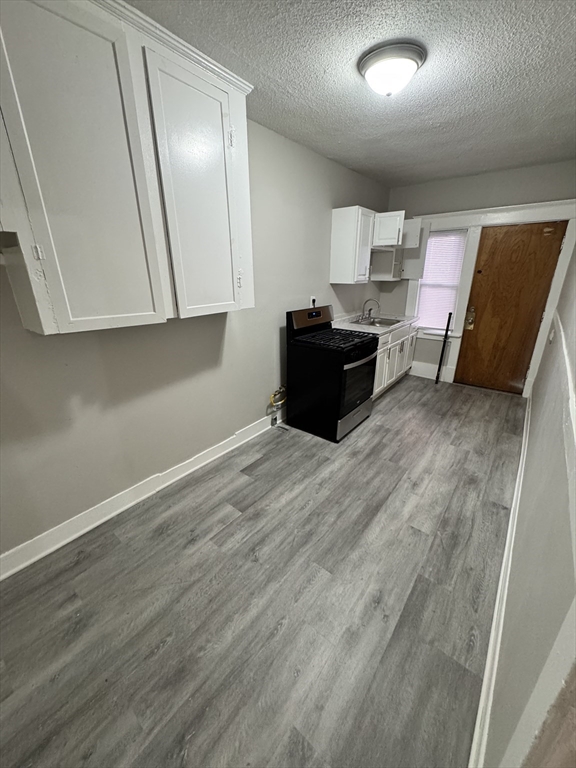 10 Marengo Park, Unit 3L Springfield, MA 01108 - Photo 2 of 8 a view of workspace with wooden floor