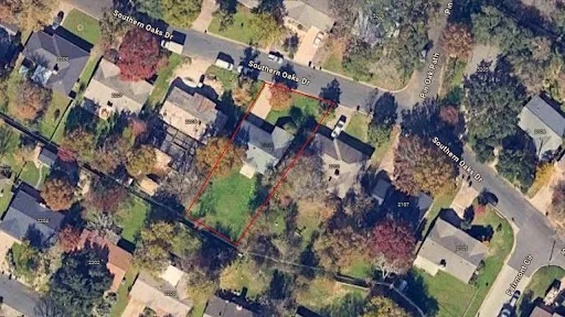 an aerial view of residential house with outdoor space