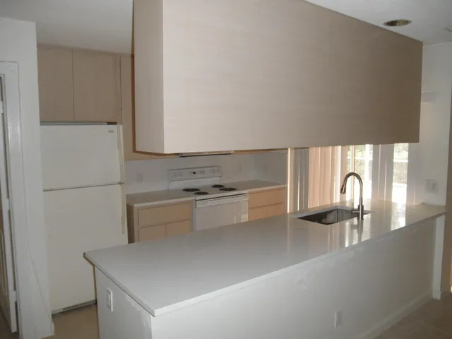 a view of kitchen with sink