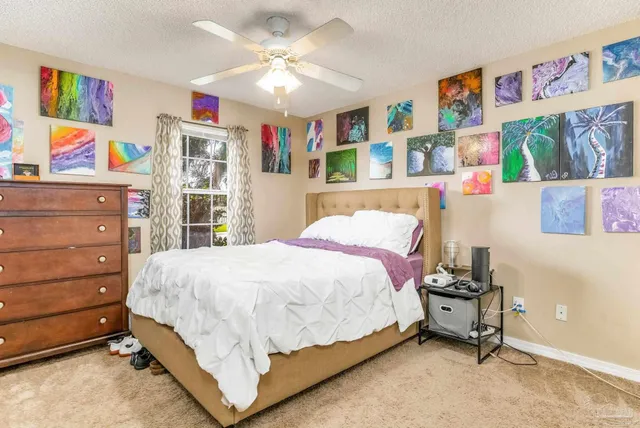 a view of a livingroom with furniture and window
