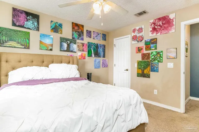 a bathroom with a toilet and a sink
