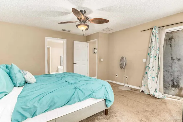 a view of a workspace with furniture