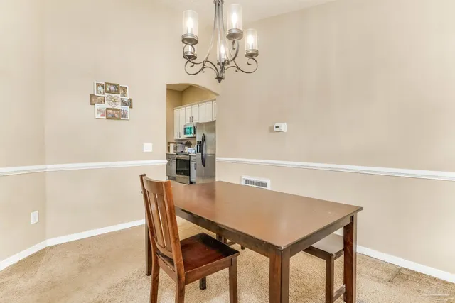 a view of a balcony with chairs
