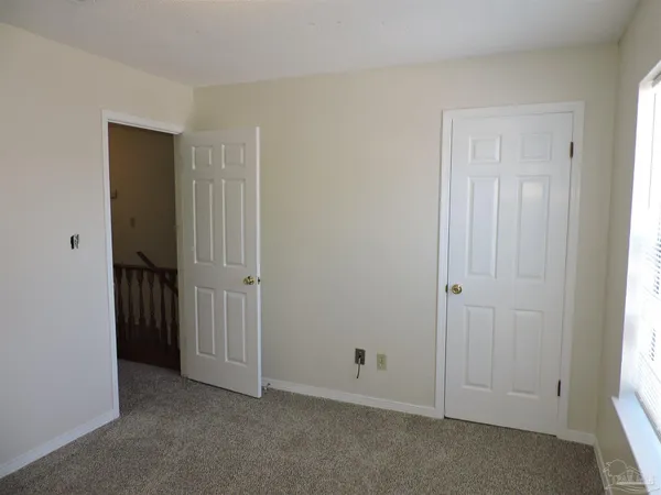 a view of an empty room with window