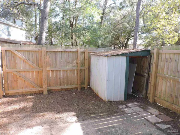 a view of a wooden fence