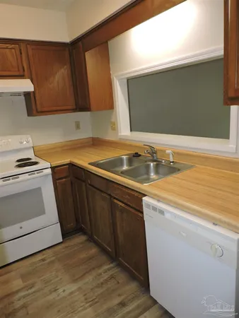 a utility room with washer and dryer