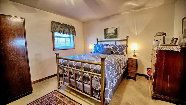 a bathroom with a sink mirror and vanity